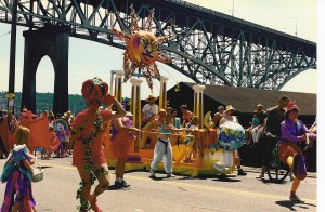 "Solstice Parade 1992 Aurora Bridge" by Joe Mabel - Photo by Joe Mabel. Licensed under CC BY-SA 3.0 via Commons - https://commons.wikimedia.org/wiki/File:Solstice_Parade_1992_Aurora_Bridge.jpg#/media/File:Solstice_Parade_1992_Aurora_Bridge.jpg